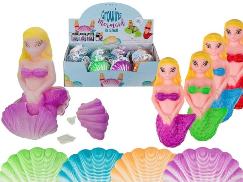 ROSNĄCA SYRENKA Z MUSZELKI WYKLUWA SIĘ Z MUSZLI 2